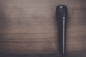 black mic on the wooden table